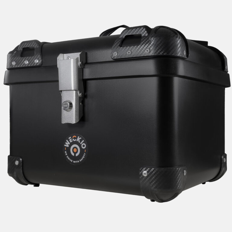 Top case Wigler Round II en noir, avec renforts en carbone et fermeture en acier inoxydable.